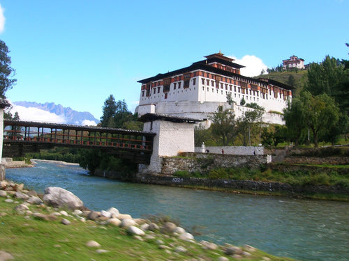 Rinpung Dzong and the covered bridge over the Paro River, Bhutan